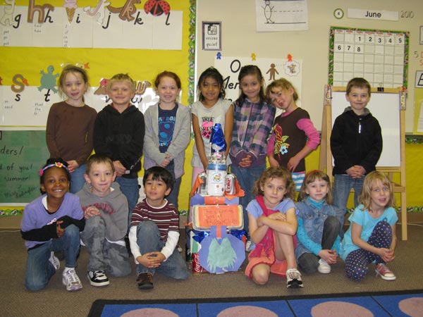 Nautilus K-8 students with recycling trophy