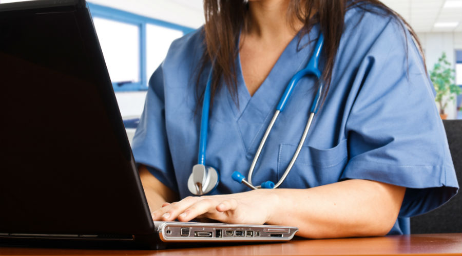 Nurse using a computer.
